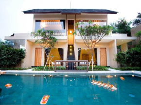 Отель Villa Cokelat  North Kuta
